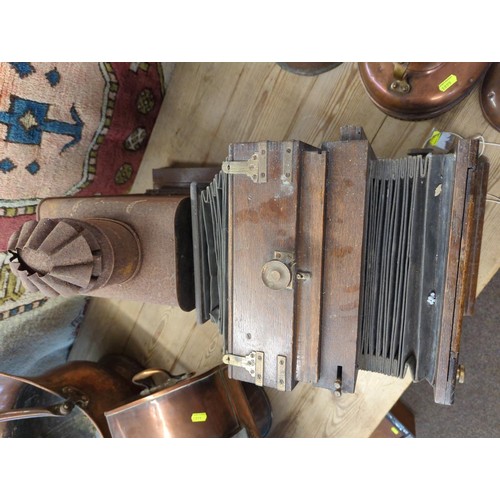 412 - Magic Lantern with wooden casing, leather bellows. Metal housing where lighting is powered with para... 