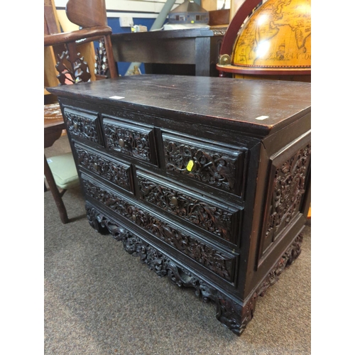 409 - Dark wood 3 over 2 over 1 chest of drawers , drawer fronts and side panels heavily carved; 79 x 41.5... 