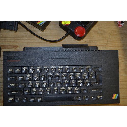 415A - ZX Spectrum bundle to include 2, ZX 48K Spectrum PC's, and 2 ZX Spectrum plus PC's 1 with case open ... 