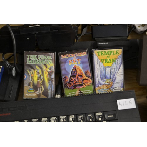 415A - ZX Spectrum bundle to include 2, ZX 48K Spectrum PC's, and 2 ZX Spectrum plus PC's 1 with case open ... 