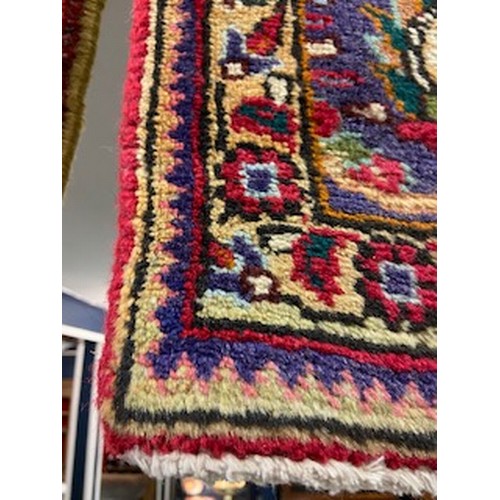 532 - Handmade Persian wool rug, in pink, blue & green tones. 288cm x 210cm