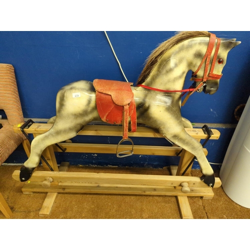 1236 - Dapple grey rocking horse with red saddle on pine swing base