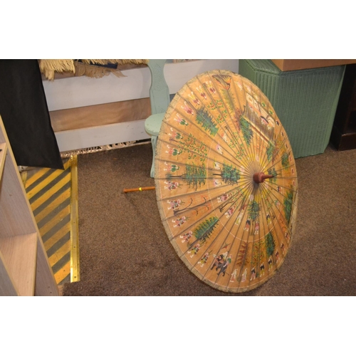 573 - Oriental parasol with detailed hand painting.