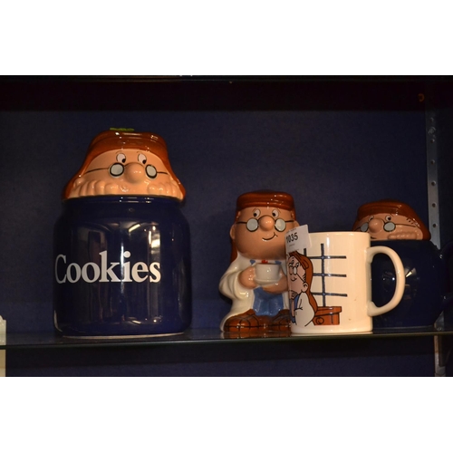 1035 - Wade Tetley cookie jar, money box and teapot with additional mug