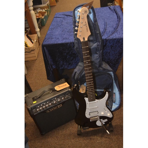 772 - Yamaha Pacifica Strat copy in black plus Ritter gig bag & stand. Included is a (LINE 6) practice... 