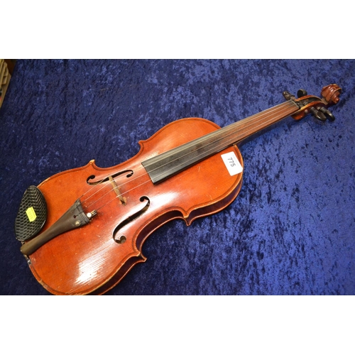 775 - Violin with strings and chin support in place.Label states 