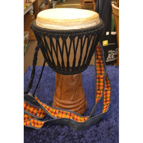 777 - Carved base and strap individual Tom Tom Height 50cm , Dia 25 drum.