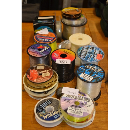 1202 - Large assortment of fishing lines all different weights.