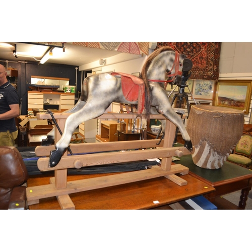 1236 - Dapple grey rocking horse with red saddle on pine swing base