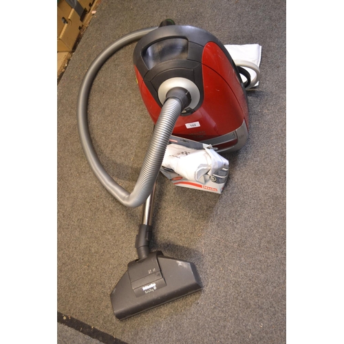 109 - Miele vacuum cleaner with attachments.