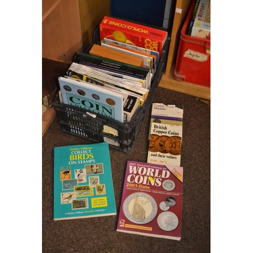 335 - Crate of coin collectors books and publications