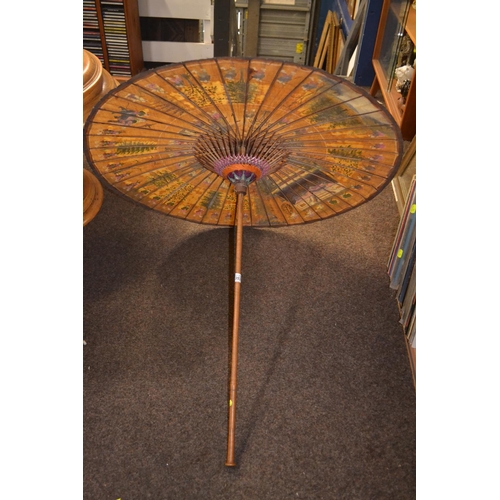 353 - Oriental parasol with detailed hand painting.