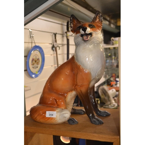 354 - Large ceramic fox, made in Italy, height 40cm