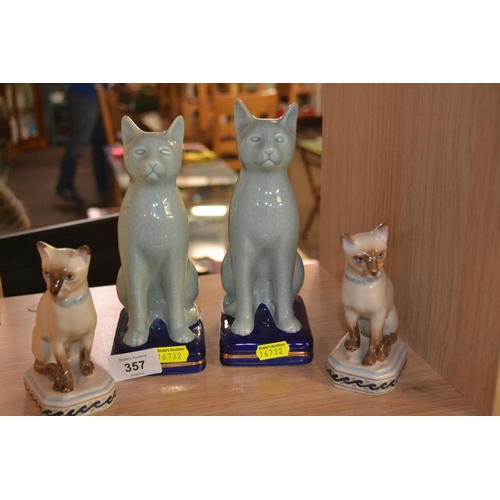 357 - Four ceramic cats, tallest 20cm