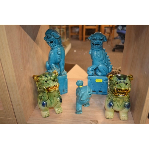 373 - Five ceramic Chinese Fu dogs