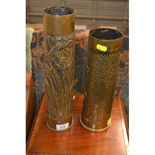 375 - Two WWI trench art vases, depicting tulips and ivy respectively, 35cm & 29.5cm high respect... 