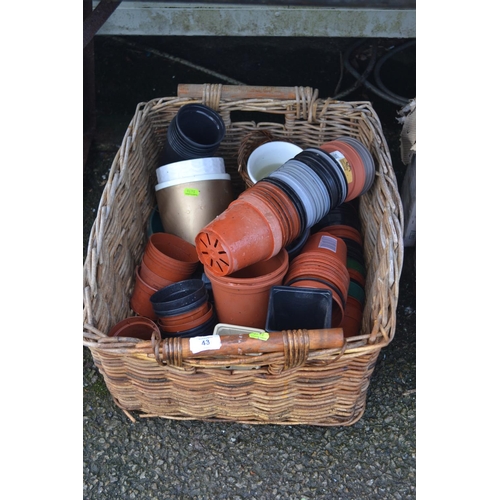 43 - Wicker basket of small plastic plant pots