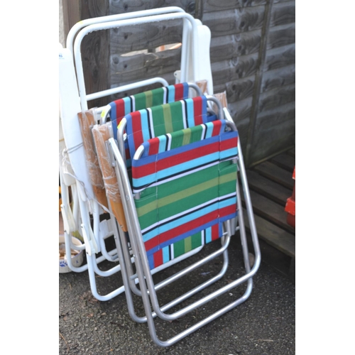 59 - 2 new fold up deck chairs & 2 fold up lounger frames (no cushions)