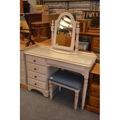 802 - Ducal glass topped white dressing table, with four drawers together with stool and swing mirror, tab... 