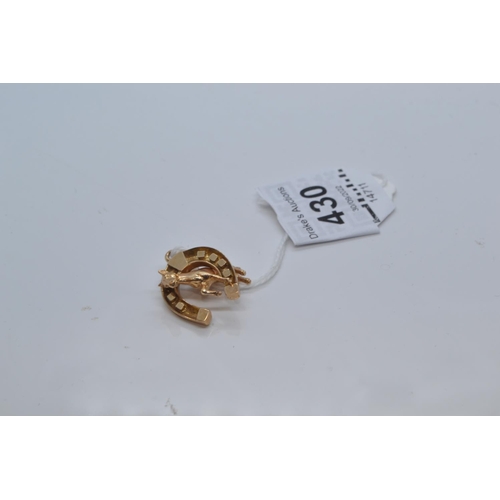 513 - Two 9ct gold charms, including a horse & horse shoe, gross weight 6.8 grams