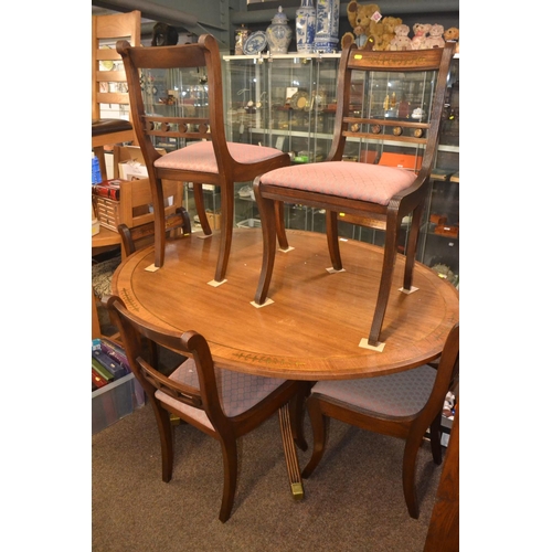 676 - Mahogany brass inset oval pedestal table with six matching upholstered dining chairs L150 x W120 x H... 