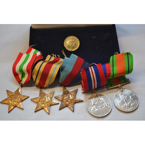 528 - WWII medal group including The Defence Medal, War Medal 1939-1945 and The Africa Star, The Italy Sta... 