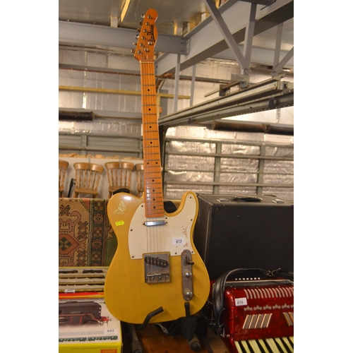 672 - Jim Deakon Telecaster shape electric guitar with stand.