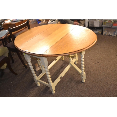 675 - Barley twist gateleg table.