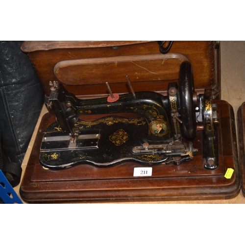 211 - Manual Bradbury sewing machine with case