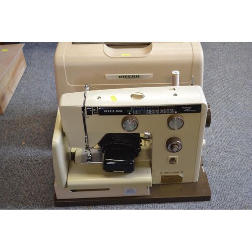 215 - Riccar sewing machine with lead and case