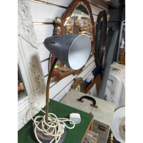 410a - Adjustable desk lamp appears vintage.