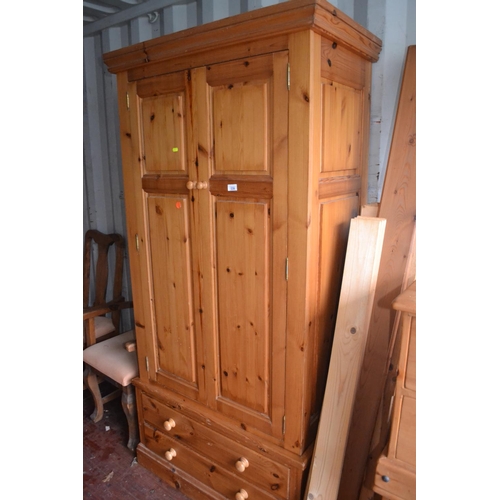 138 - Pine double wardrobe with 2 lower drawers w88cm d52cm H196cm