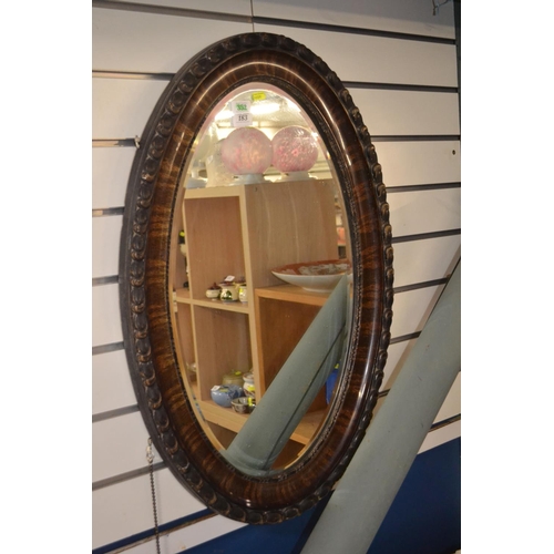 183 - Oval bevelled mirror 82 x 54cm