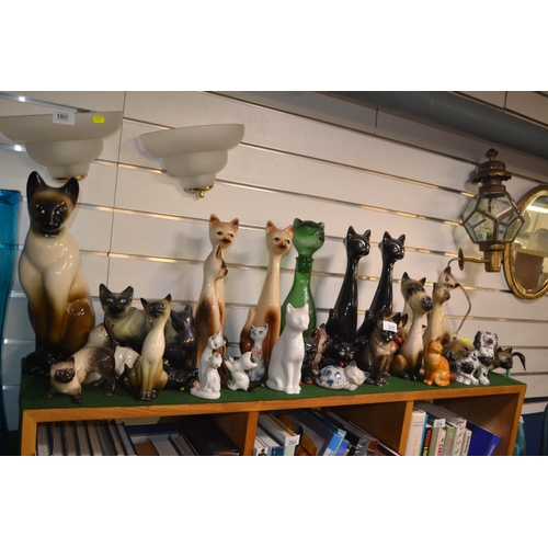 202 - Large collection of cat collectables, mostly ceramic, inc. Beswick and Spur Pottery with a small Sta... 