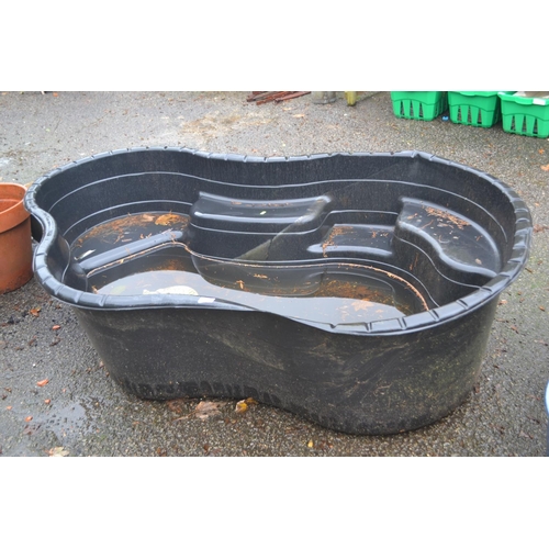 28 - Large garden pond liner. L183cm D46cm. With 2 ornaments.