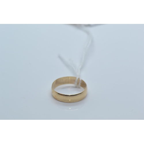 329 - 9ct gold band ring, size O1/2, 2.05 grams