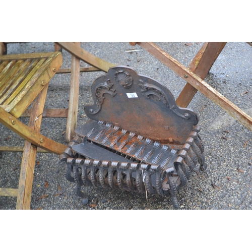 33 - Cast fire grate with ornate back. Grate H24cm W46cm D26cm