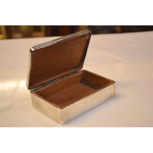 355 - Silver cigarette box with monogram, HM Birmingham 1934, makers mark rubbed, lined, 12.5cm wide