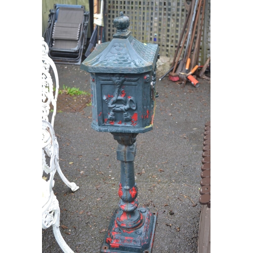 40 - Cast iron free standing post box. H114cm.