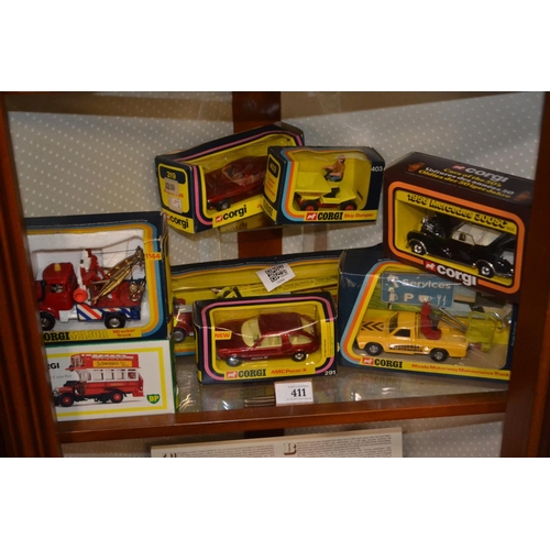 411 - Collection of Corgi model cars and trucks, all boxed.