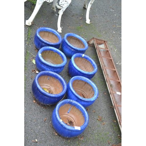 42 - 7 blue glazed planters. D24cm