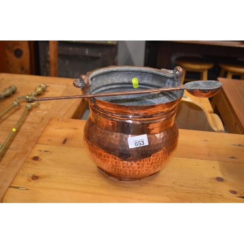 653 - Copper handled vessel with ladle 21cm diameter 21cm high.