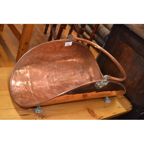 655 - Copper log trug with brass claw feet. 59cm long