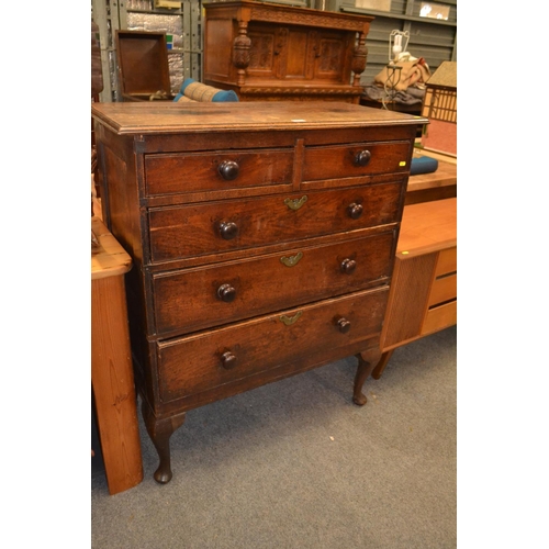 660 - Late Georgian oak 2 over 3 chest of drawers, raised on tall cabriole legs. W97cm D46cm H117cm