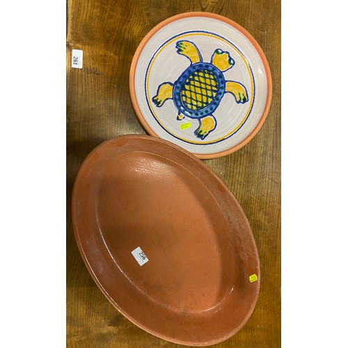 256 - Australian studio pottery plate with turtle design and a large oval terracotta dish, L47cm W32cm