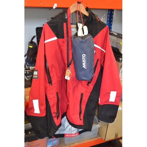 117 - Helly Hansen Waterproof Sailing Jacket size XL + two pairs of gloves.