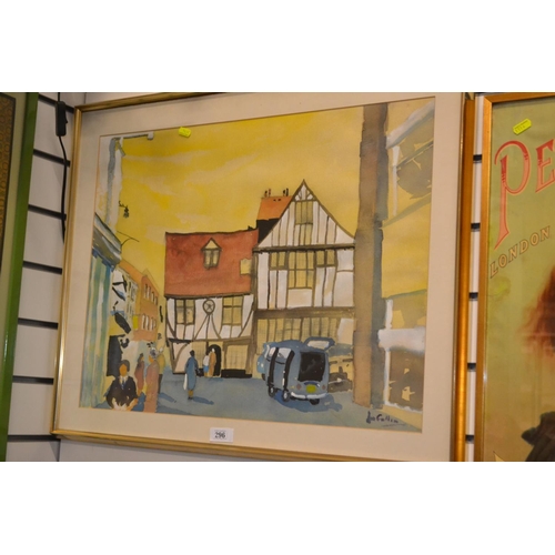296 - Framed water colour of a town scene, signed bottom right.