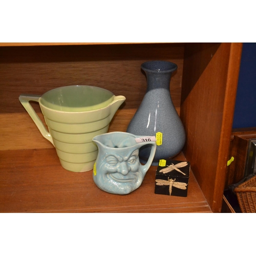 316 - Deco style jug, character jug, vase and a dragonfly trinket box