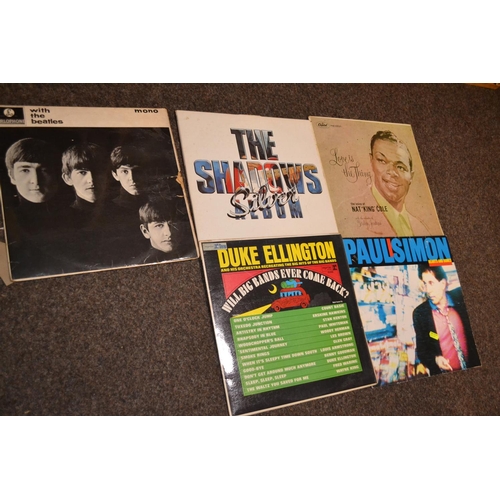 338 - Five vinyl LP's inc. The Beatles, The Shadows, Nat King Cole, Paul Simon and Duke Ellington