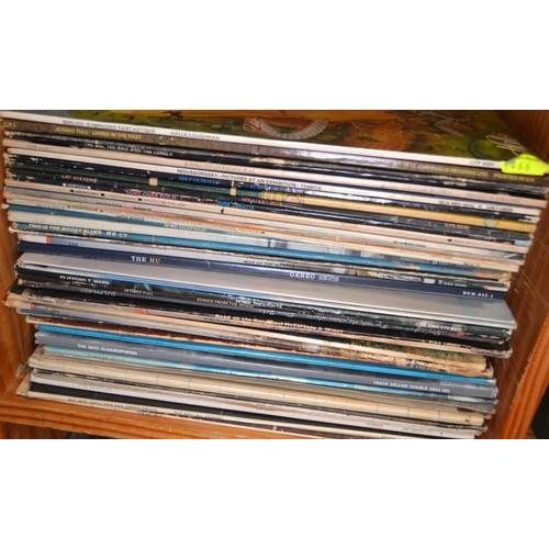 339 - Shelf of vinyl LP's inc. Jethro Tull, The Who, Mike Oldfield and The Beatles